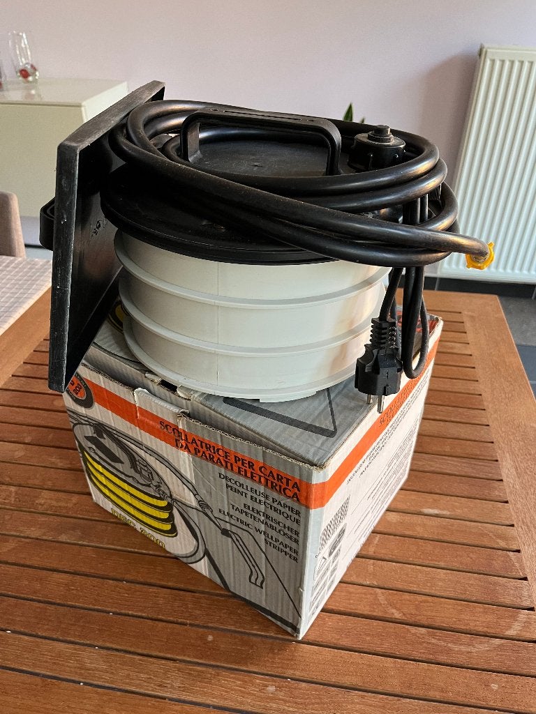 Behangafstomer, Ophalen