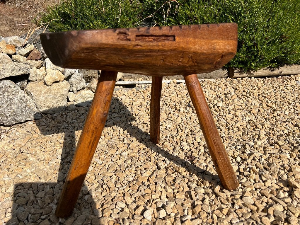 Tabouret tripode, Ophalen