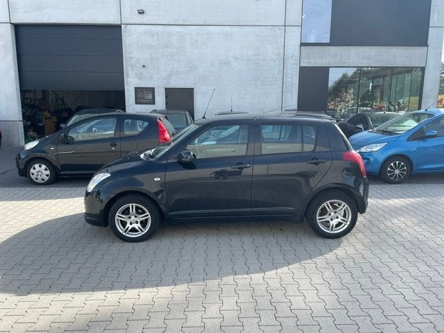 Suzuki Swift 1.3I, Manueel, 4 Deuren, keuring + Garantie, Voorwielaandrijving, Stof, 140 g/km, Zwart