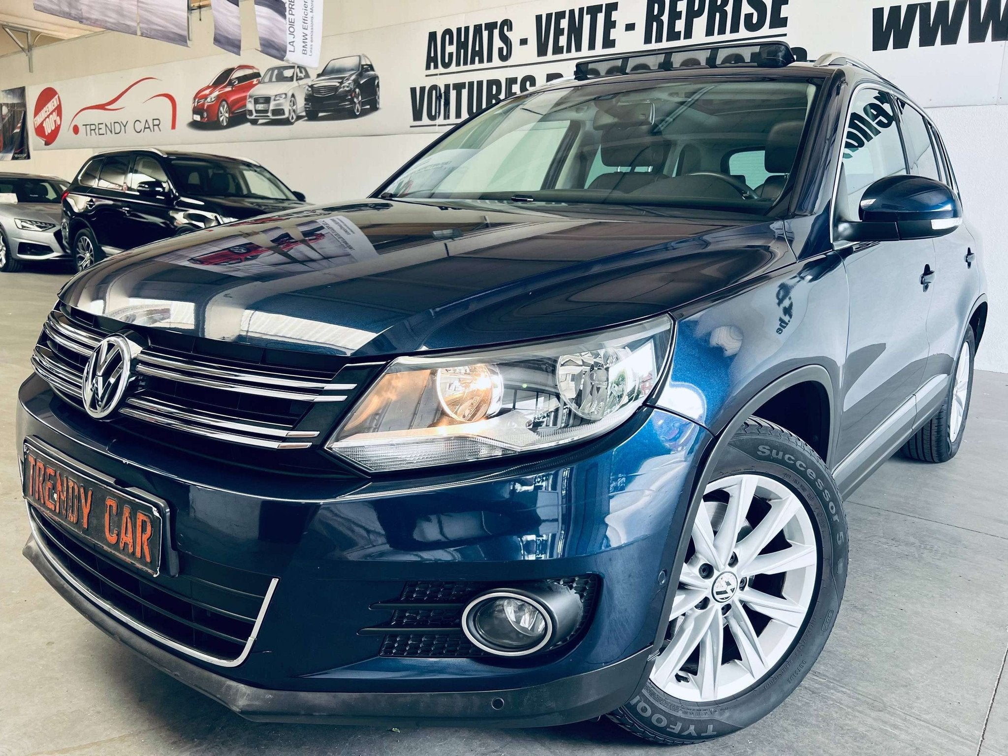 Volkswagen Tiguan 1.4 TSI Sport+NAVI+CUIR+PANO+CARNET+CARPAS, Auto's, Euro 5, Gebruikt, Zwart, 4 cilinders