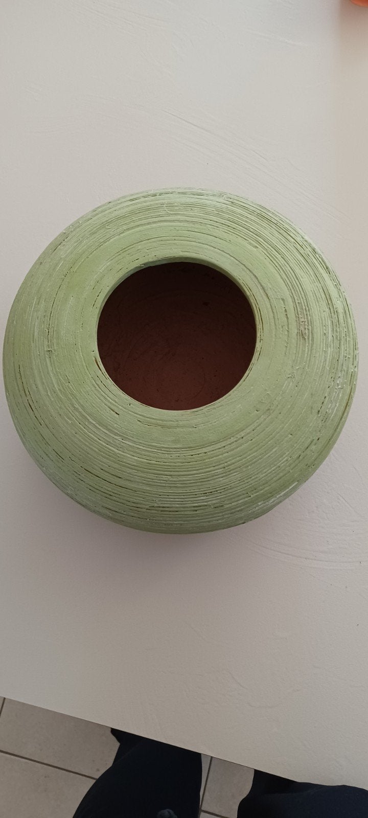 groene vaas, Ophalen