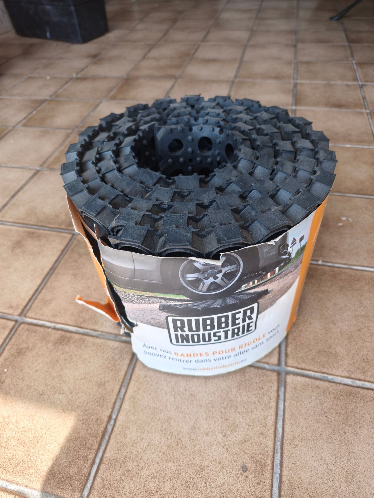 Rubber rol voor goot., Ophalen