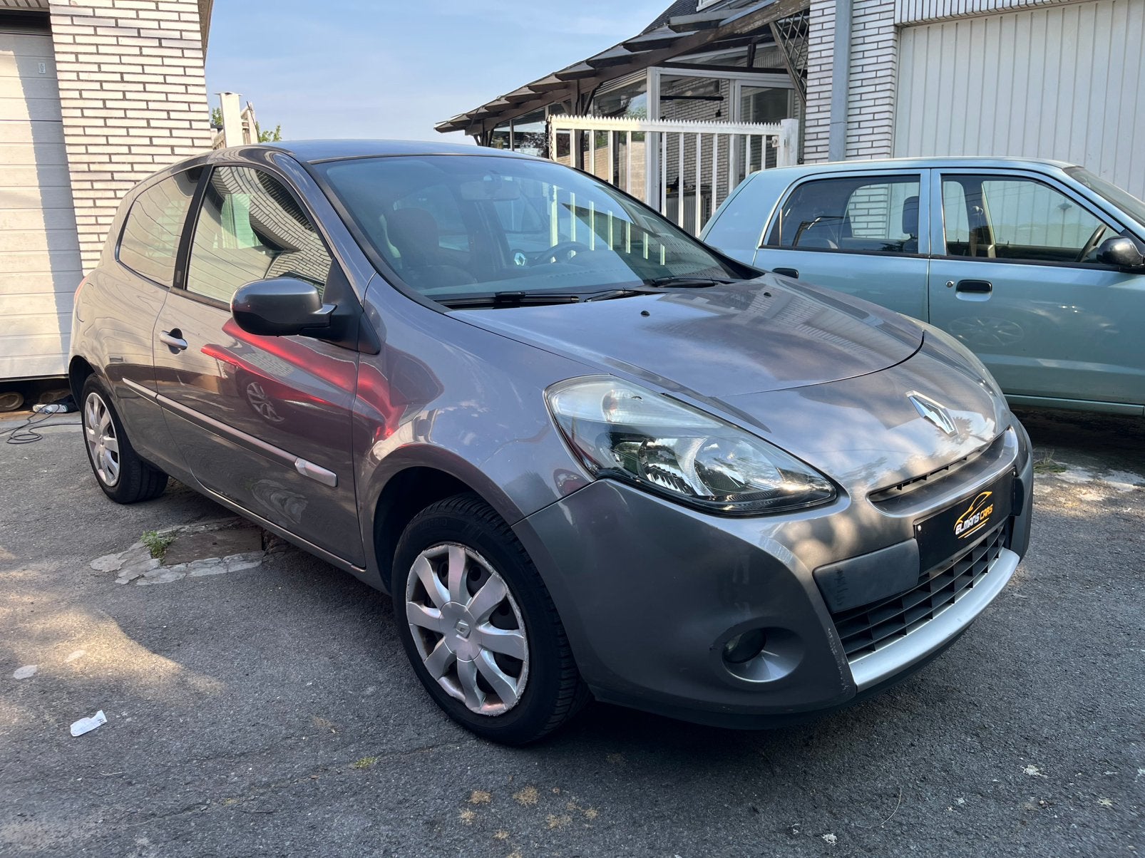Renault Clio - 1.2i Benzine - AIRCO - 2011, Autos, Renault, Particulier, Vitres électriques, Essence, Euro 5, Boîte manuelle, Argent ou Gris
