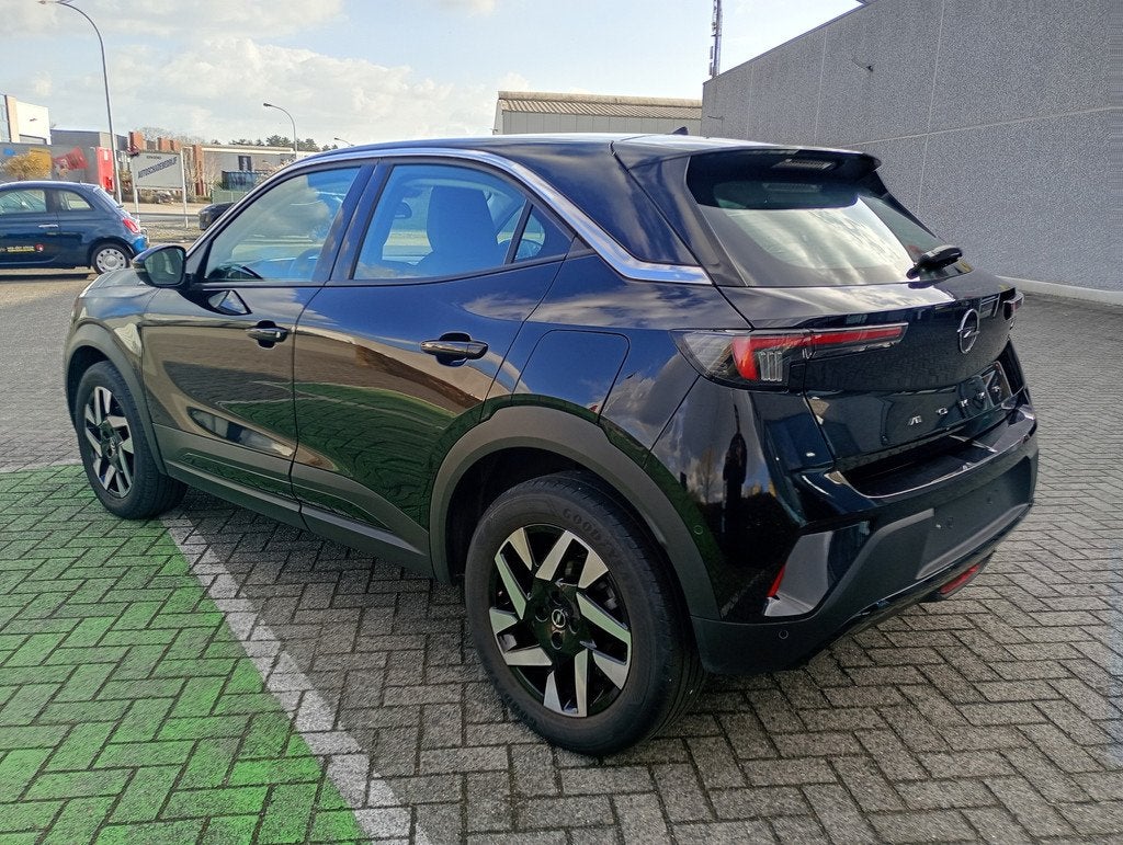 Opel Mokka 2024 | Benzine | Handgeschakeld | Lage KM | Jonge, Auto's, Opel, Voorwielaandrijving, Stof, Gebruikt, Euro 6