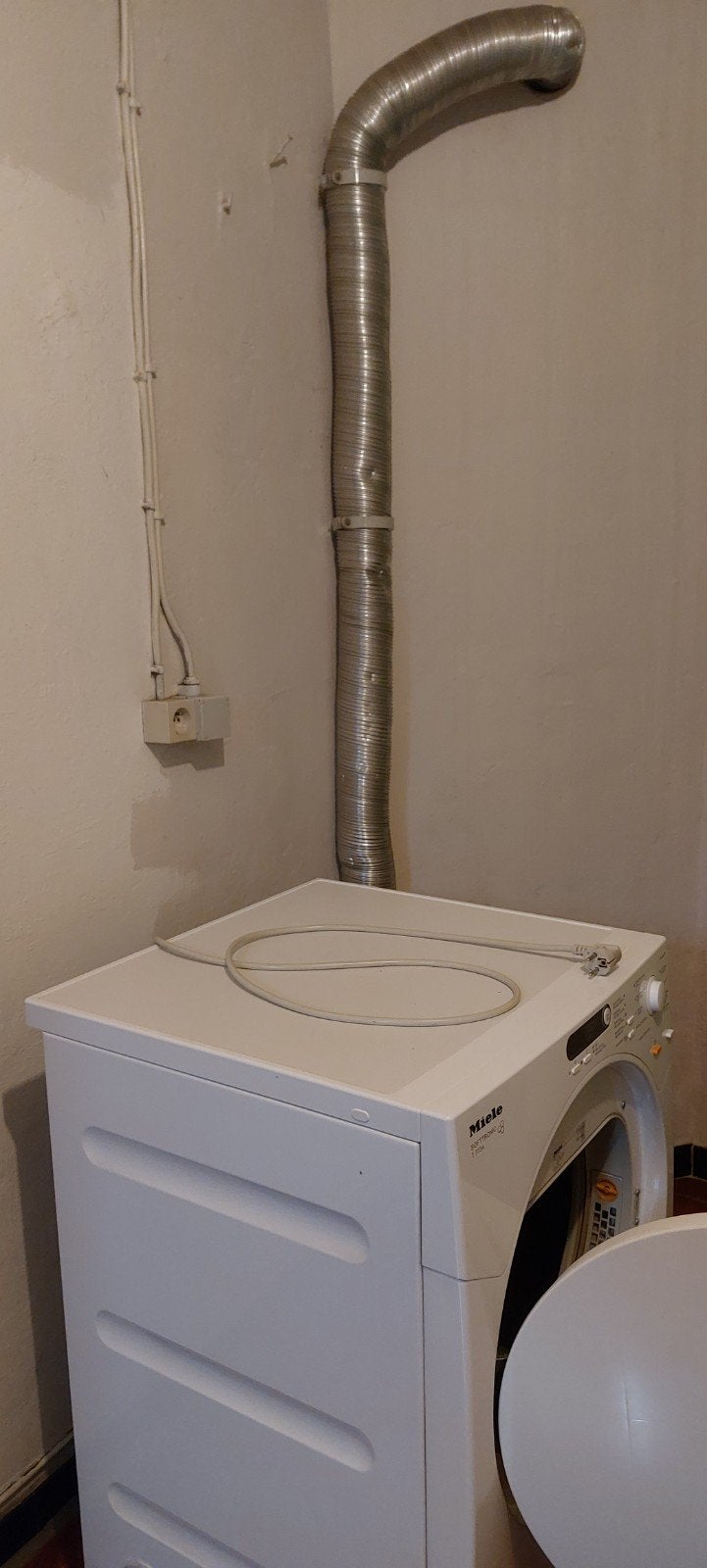 droogkast miele met afvoerbuis, Ophalen