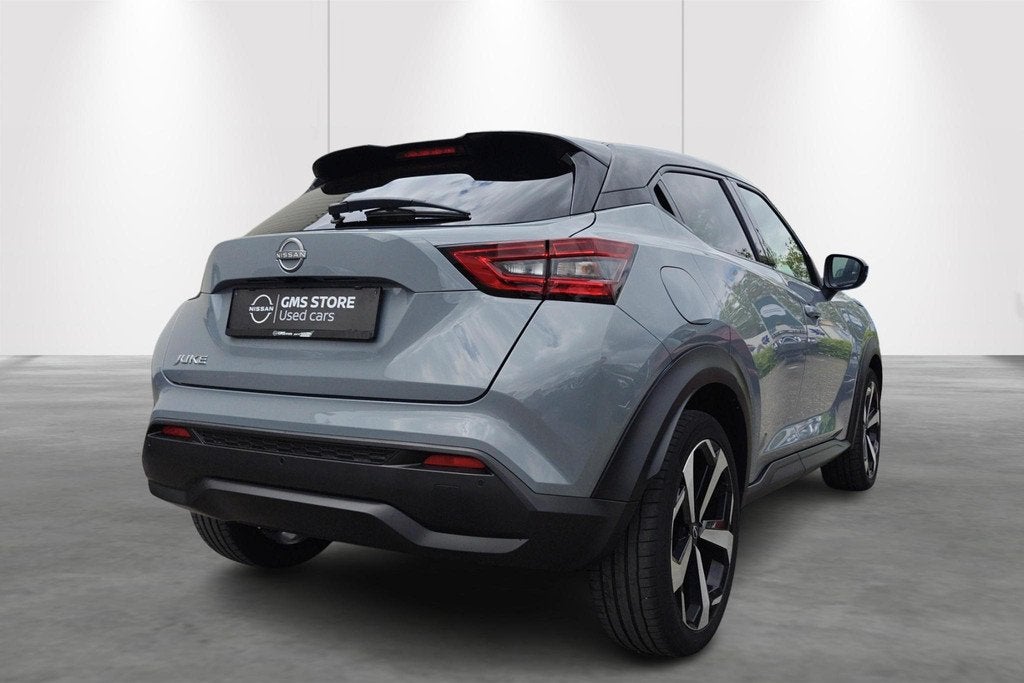 Nissan Juke 1.0 DIG-T 114 DCT Tekna + Cold Pack + Sound Pack, Auto's, Nissan, Stof, Zwart, 628 kg, 5 zetels