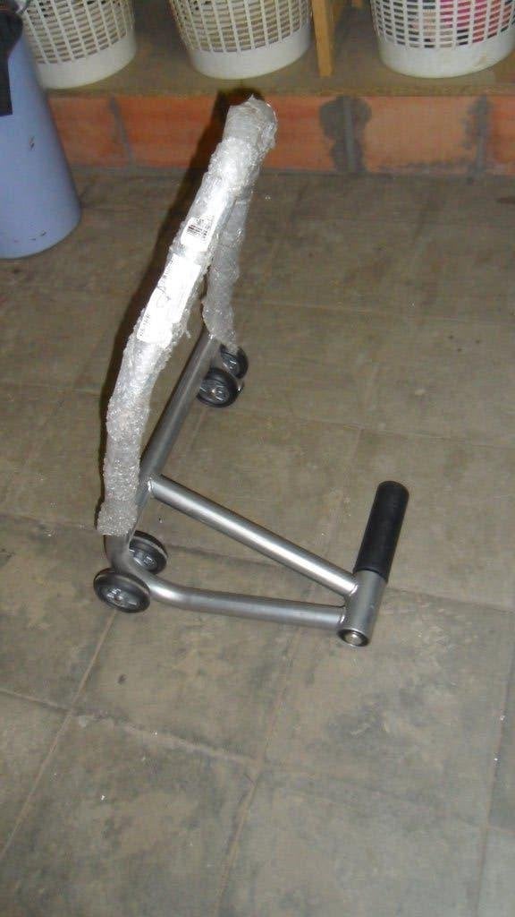 paddockstand voor motoren, Ophalen
