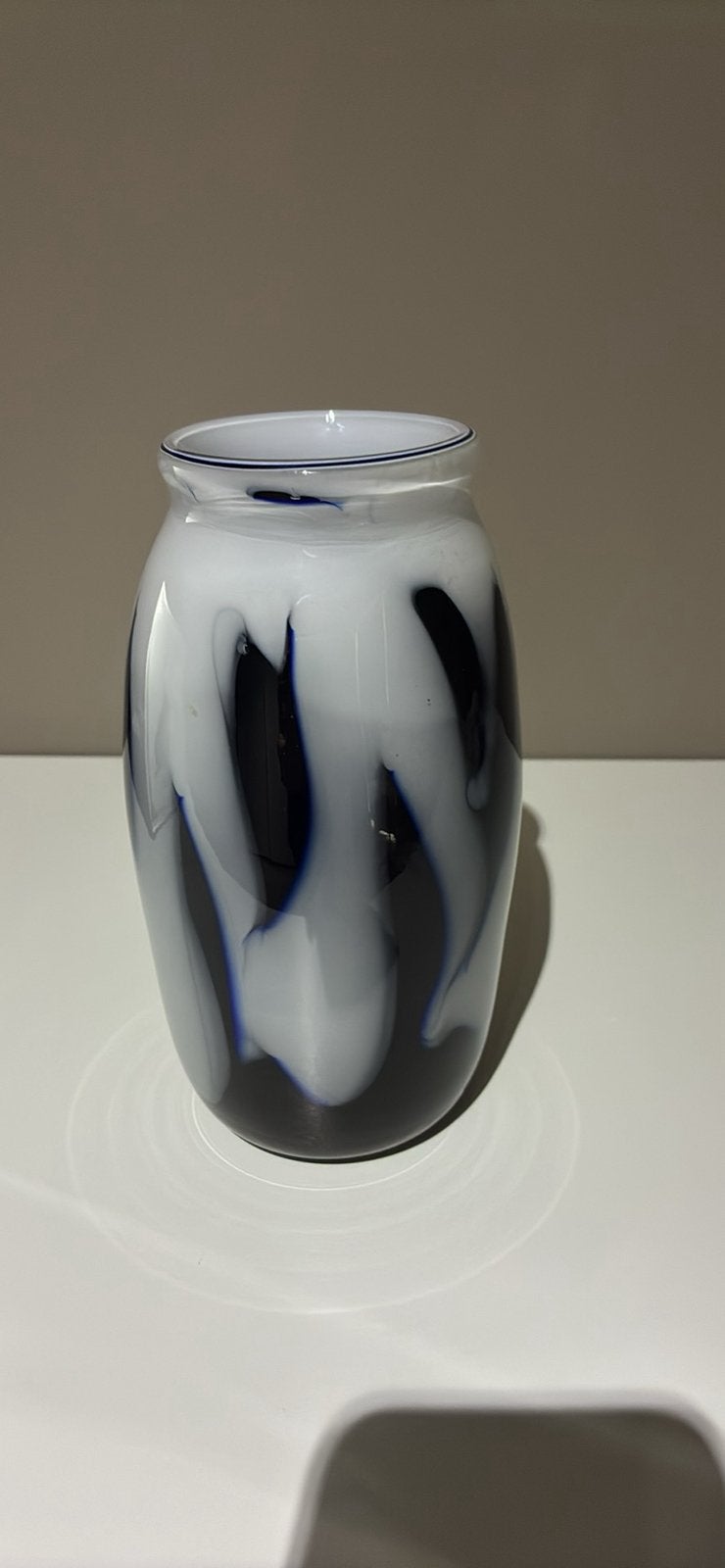 Vaasje in Booms glas, Ophalen