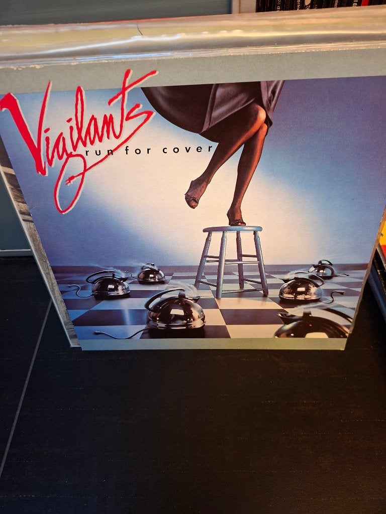 lp - vigilants - run for cover - bak 5, Enlèvement ou Envoi, Utilisé, Hard rock, Pochette photo