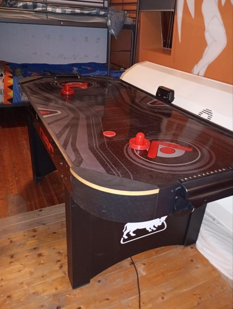 Grande table de hockey sur air solide d'Astrodisc, Enlèvement