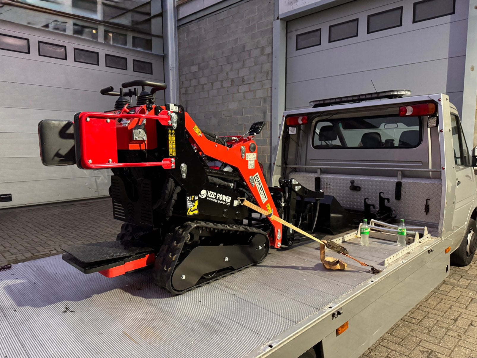 Skidsteer te huur, Ophalen