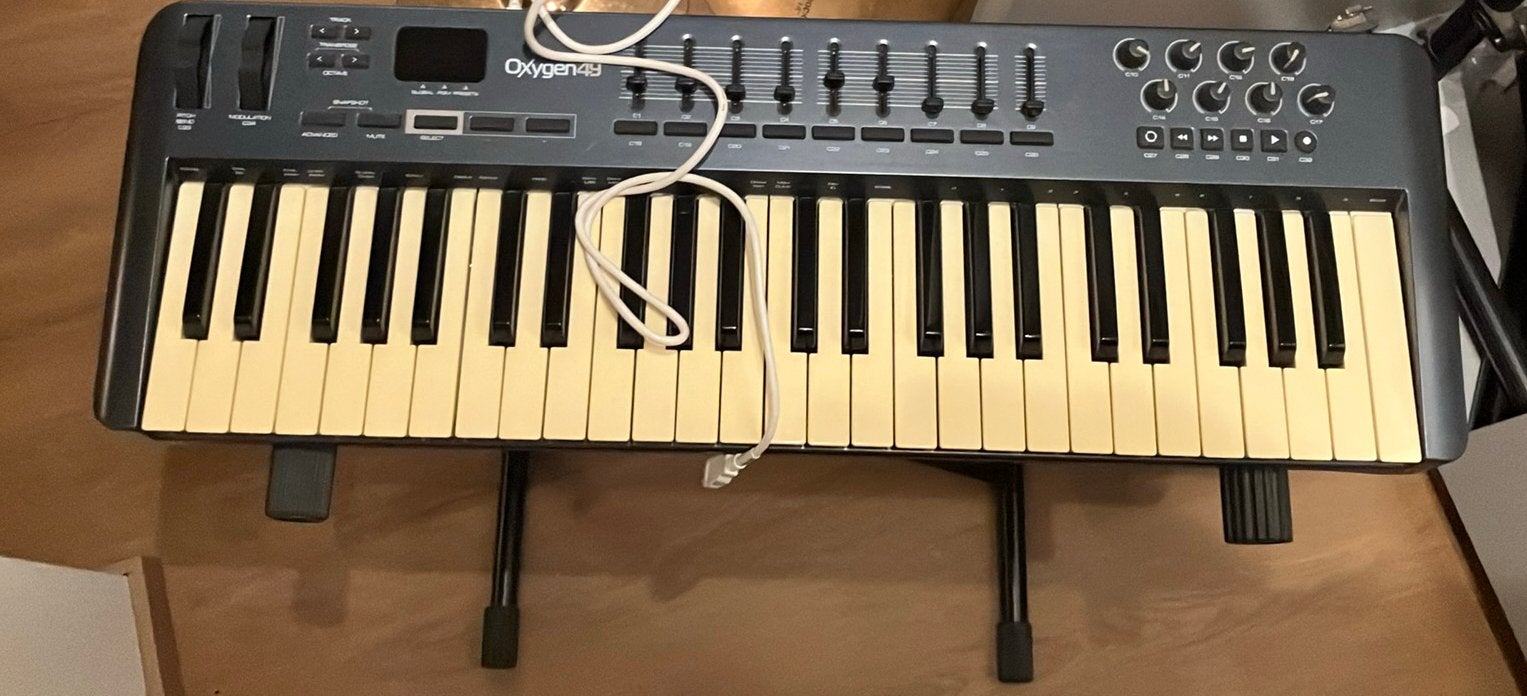 M-Audio Oxygen 49 controller met statief, Musique & Instruments, Enlèvement, Comme neuf