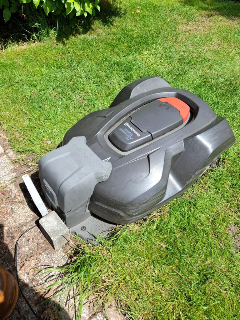 Husqvarna automower 420 met laadstation, Ophalen