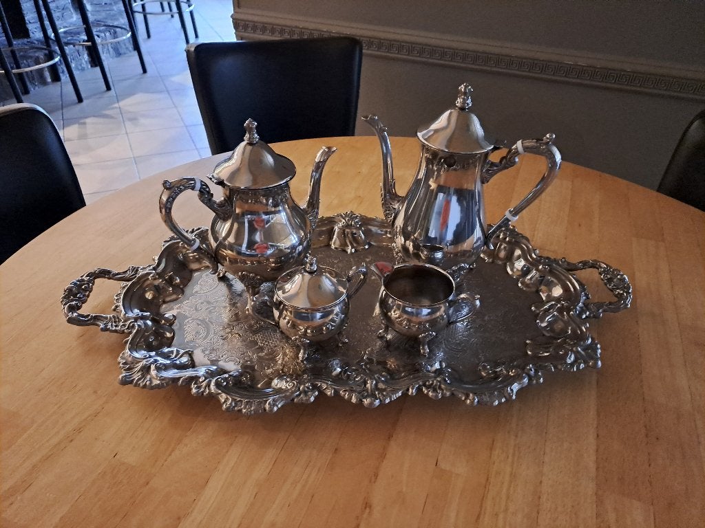 verzilverd koffie-en theeservies, Enlèvement