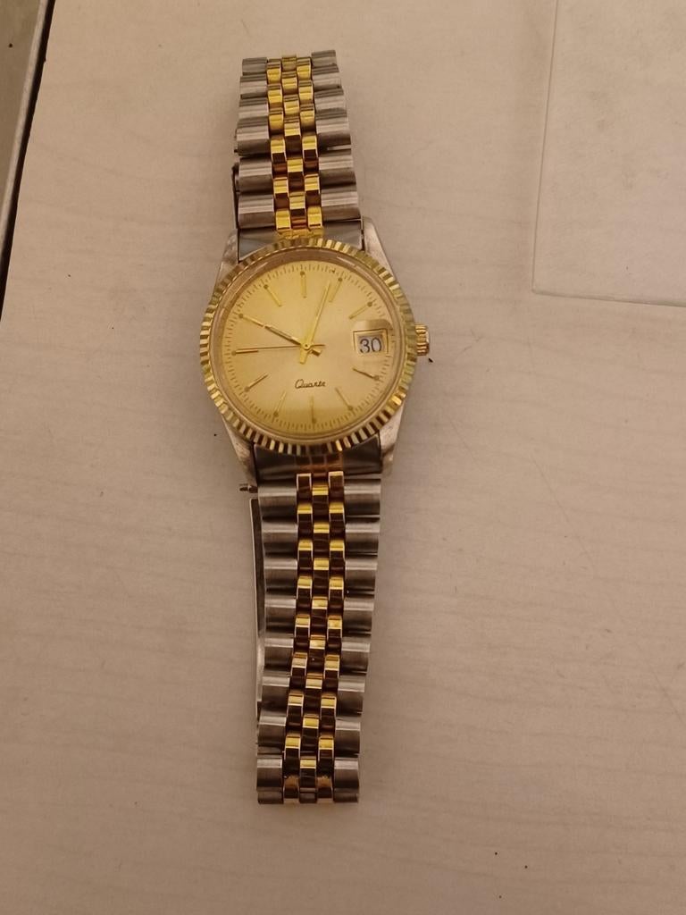 Quartz zilver/goudkleurig mannen horloge, Bijoux, Sacs & Beauté, Montres | Hommes, Enlèvement ou Envoi, Utilisé, Argent