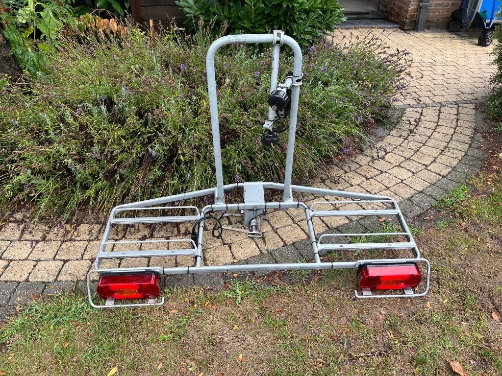 fietsendrager, Ophalen