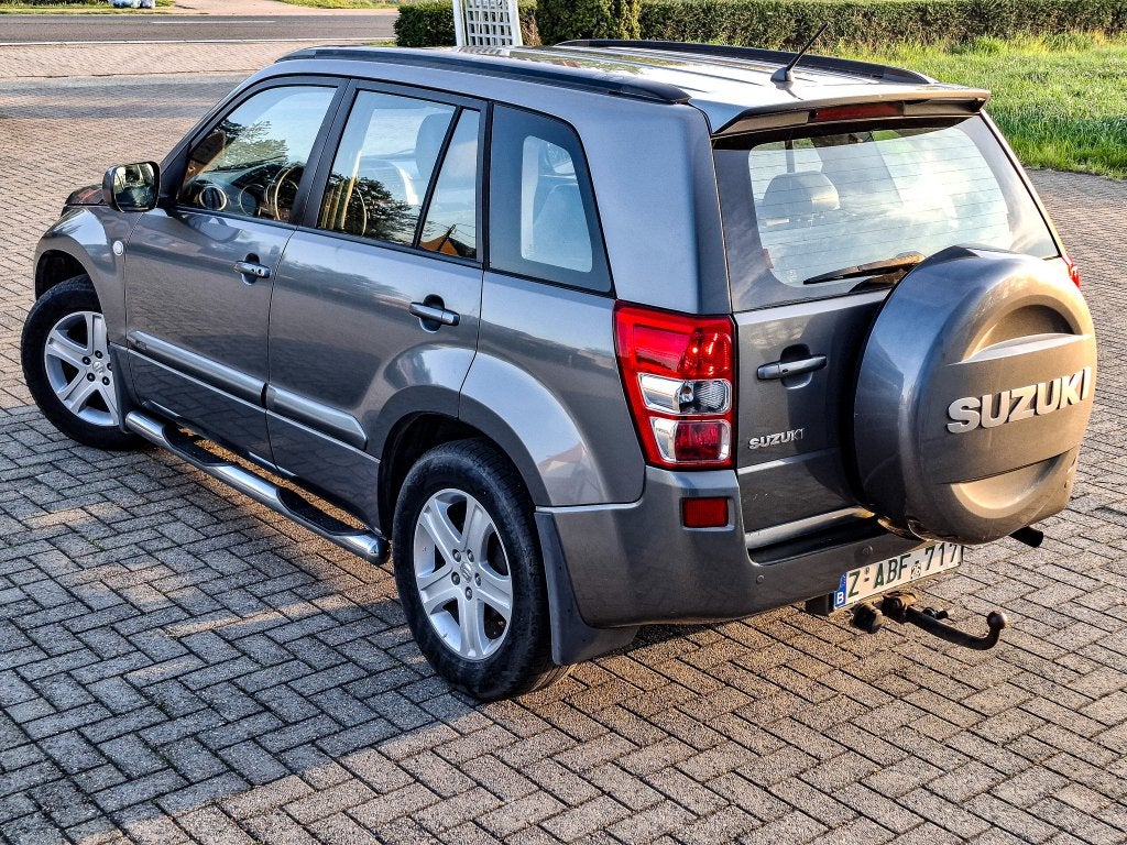 Suzuki Grand Vitara 2.0 Benzine 4x4 Trekhaak, Auto's, Suzuki, Zwart, 4 cilinders, Grand Vitara, Leder