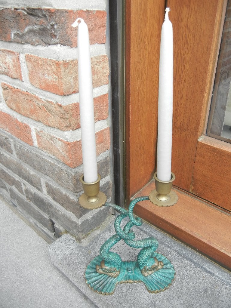 dubbele kandelaar (zeeslangen), Ophalen, Koper of Brons