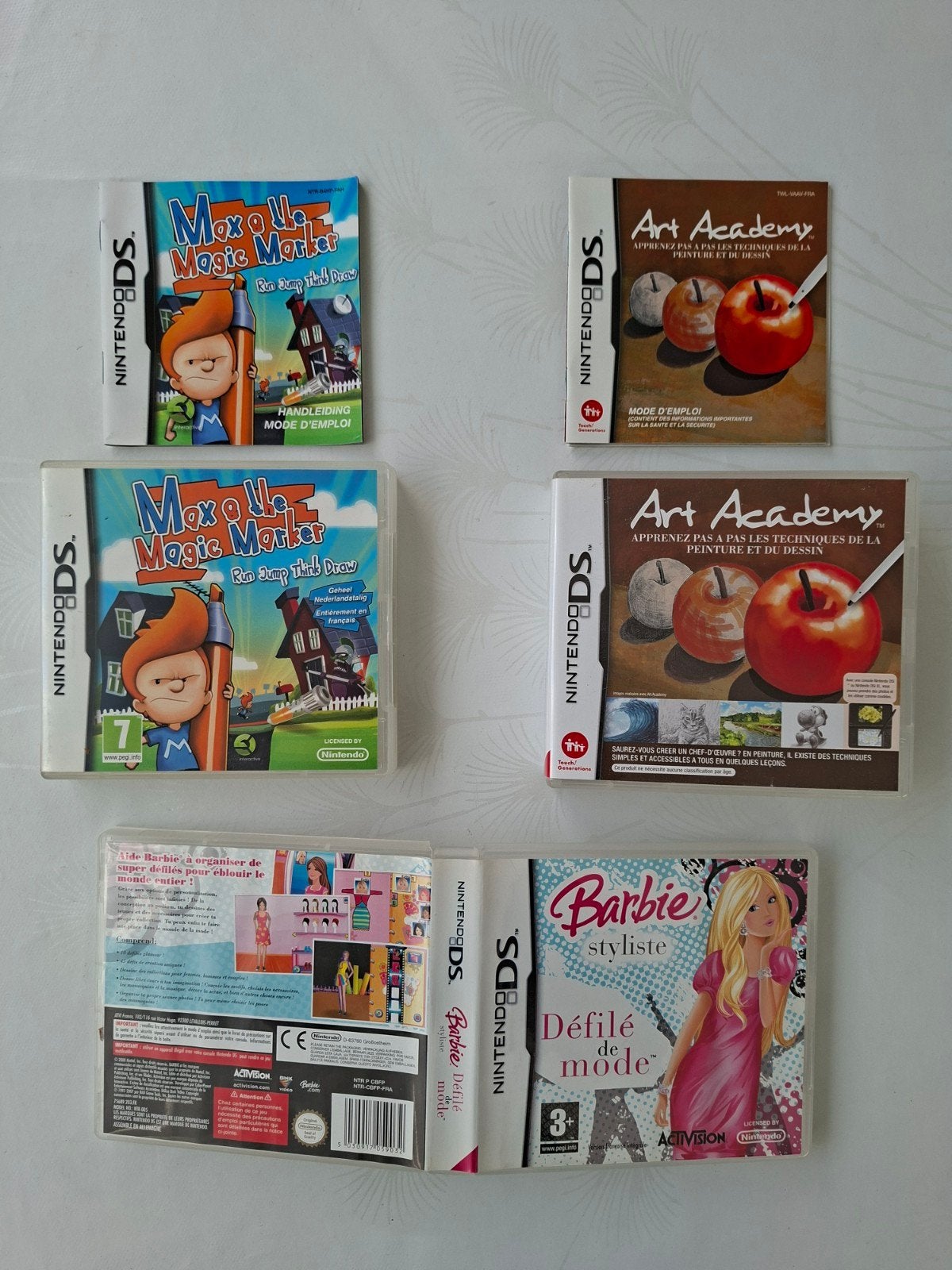 Spelletjes, hoesjes, handleidingen en een Nintendo ds-game., Verzamelen, Telefoonkaarten, Ophalen of Verzenden