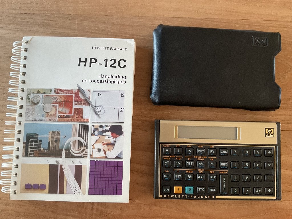 Hewlett-Packard 12C + handleiding NL., Diversen, Rekenmachines, Ophalen, Zo goed als nieuw