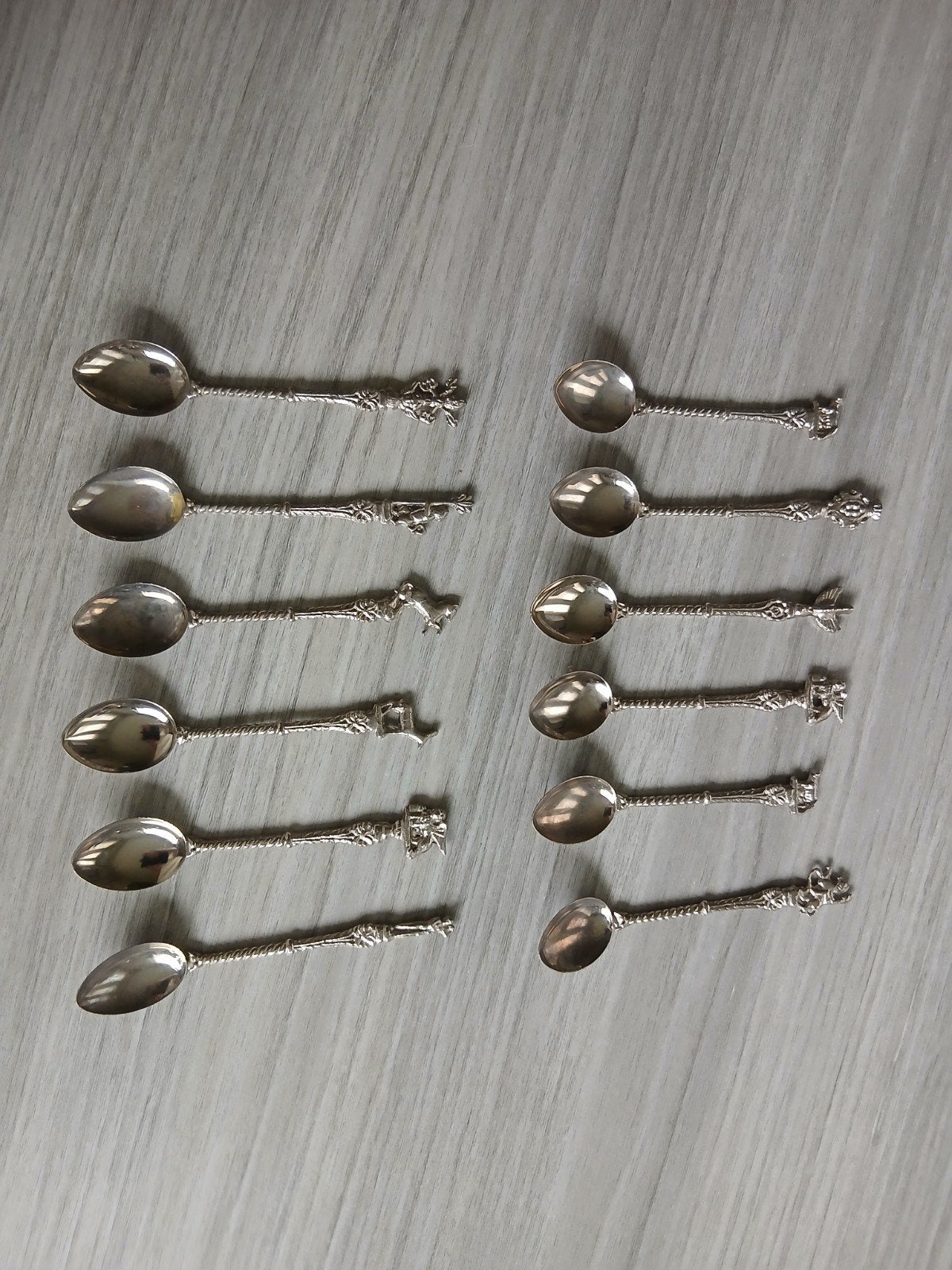 set 12 verzilverde lepeltjes, Ophalen