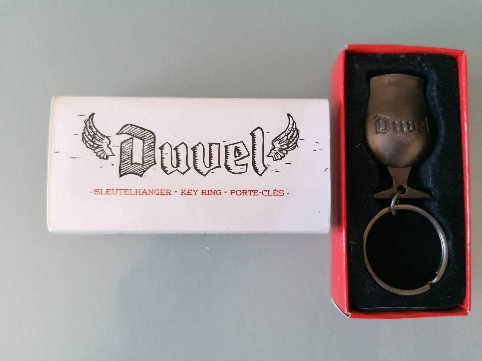 Splinternieuwe sleutelhanger +flesopener, biermerk DUVEL, Collections, Marques de bière, Ouvre-bouteille, Duvel, Enlèvement