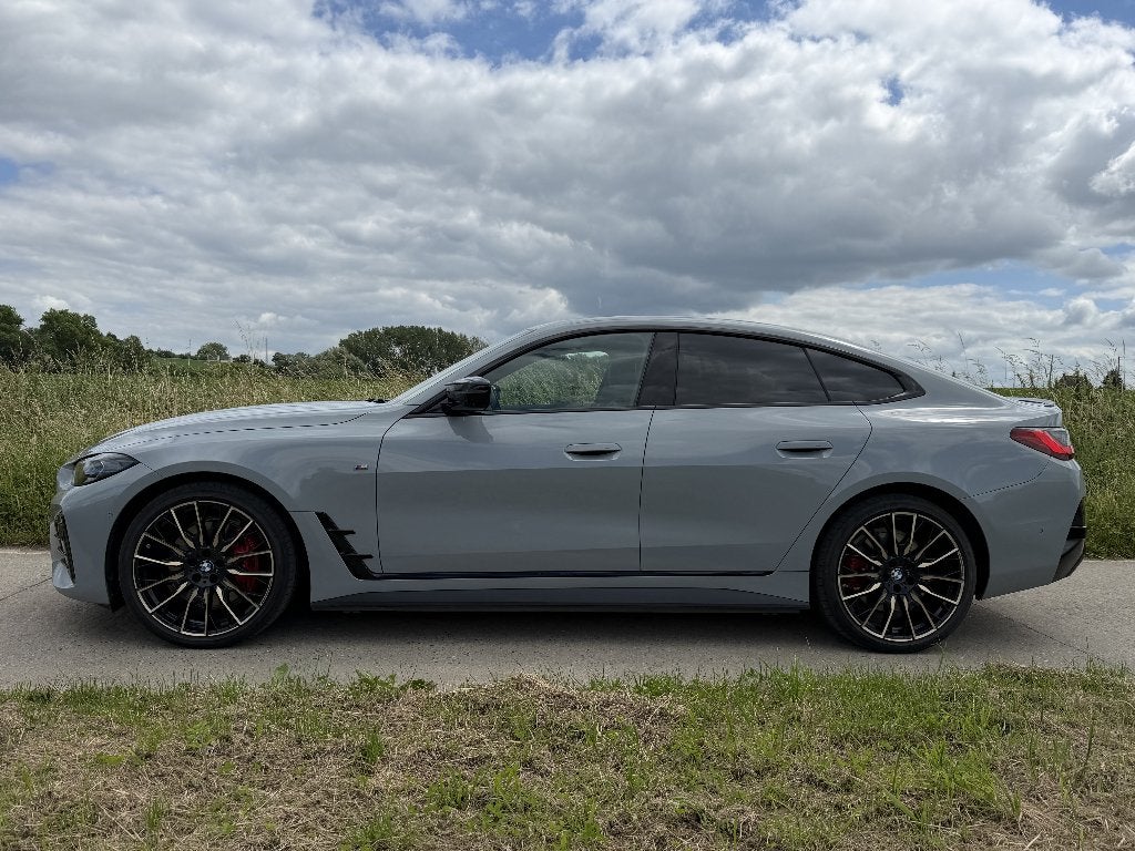 BMW i4 M50 Gran Coupe, Auto's, BMW, Zwart, Leder, Elektrisch, Berline