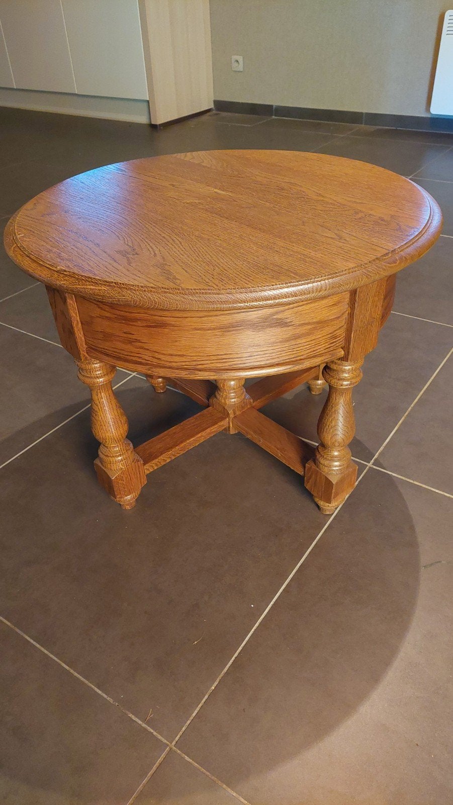 Ronde salontafel, Ophalen