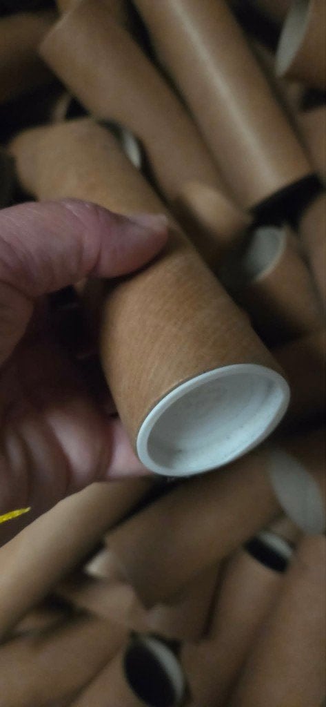 kartonnen buisjes met deksel, Zakelijke goederen, Ophalen