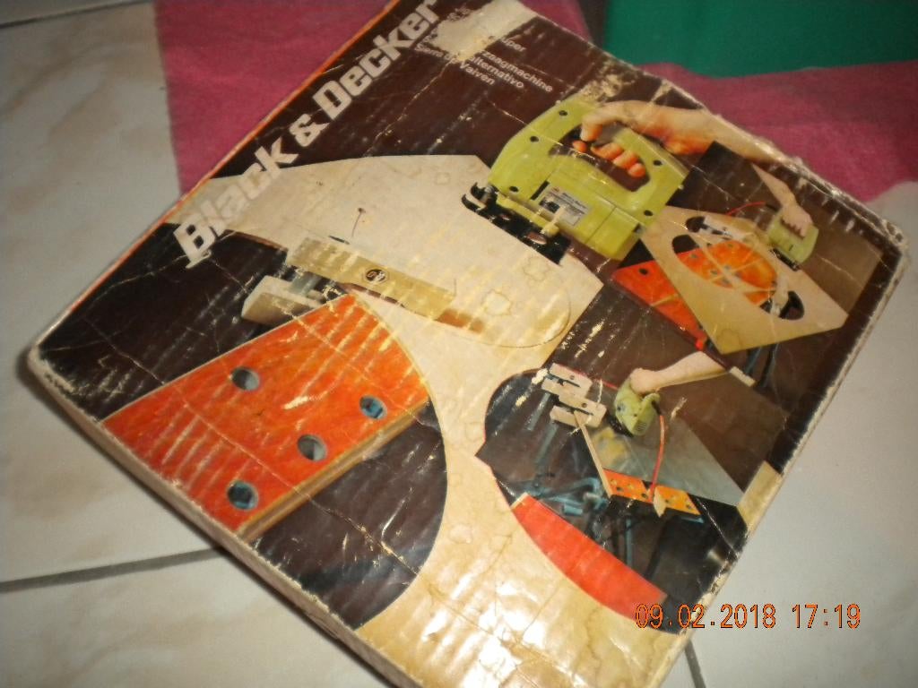 Decoupeerzaagmachine, Ophalen