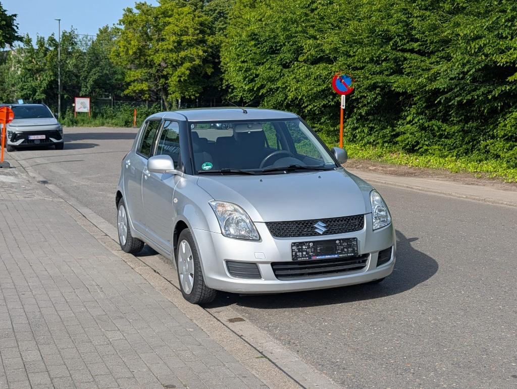 Suzuki Swift 1.3i - Airco + Keuring - Garantie, Auto's, Voorwielaandrijving, Stof, Zwart, Swift