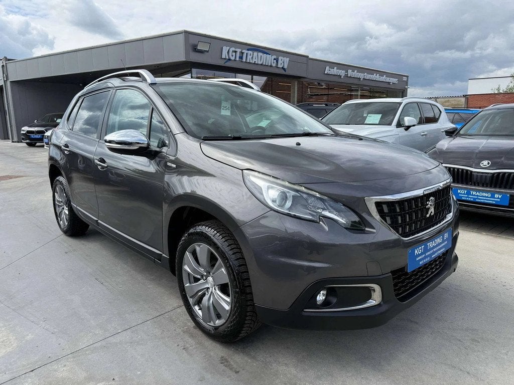 Peugeot 2008 1.2i NAVIGATIE PDC DIGITALE AIRCO CARPLAY BLUET, Auto's, Peugeot, Gebruikt, 1199 cc, Bedrijf, Zilver of Grijs