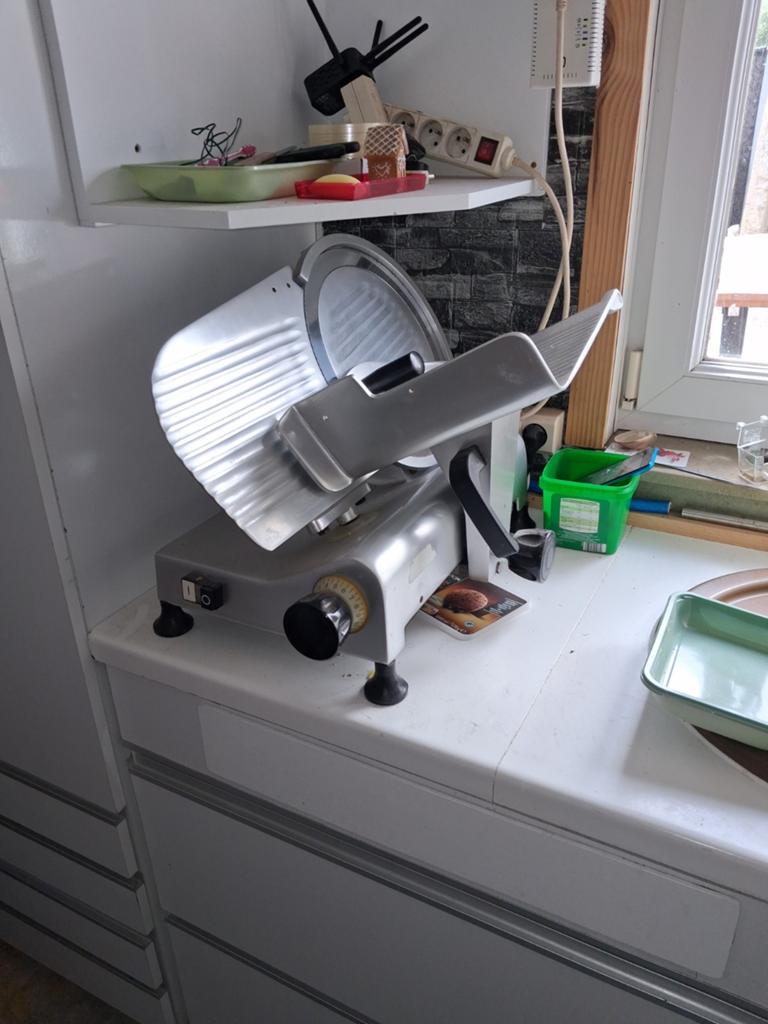 Professionele vleessnijmachine in goede staat, Enlèvement