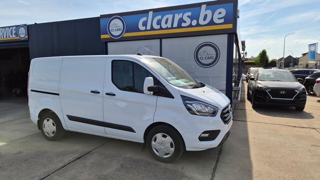 Ford Transit Custom 2.0D/Euro6/L1/Navi/Cam/Cc/Bt/Trekhaak/17, Auto's, Bestelwagens en Lichte vracht, Stof, Euro 6, Wit, 131 pk