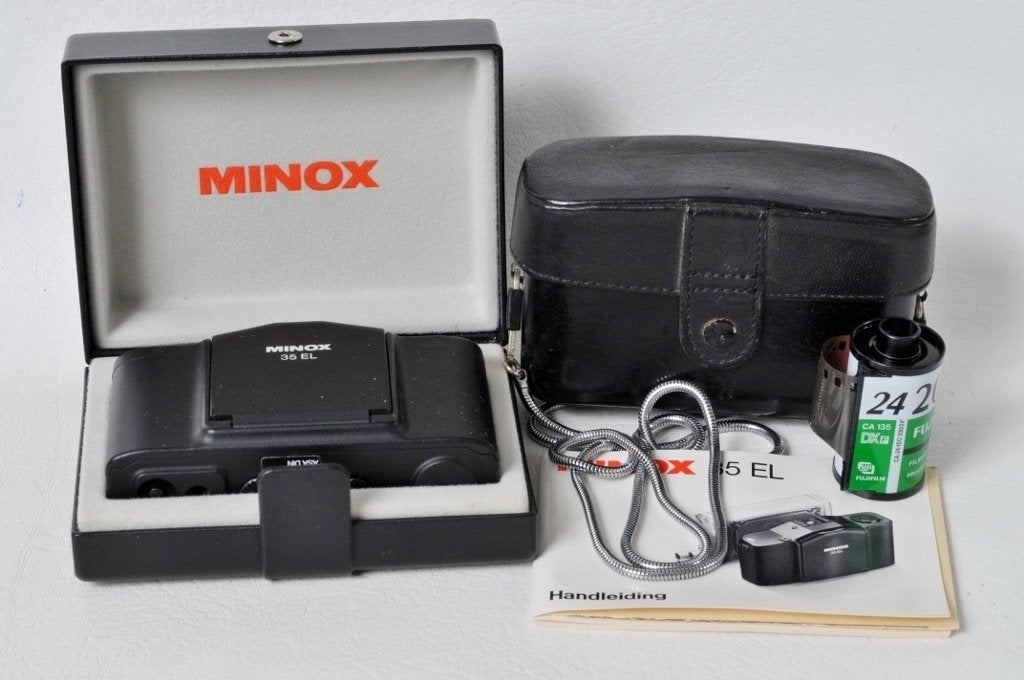 Minox GL + leren tas + opbergdoos + i, Ophalen of Verzenden, Zo goed als nieuw, Compact