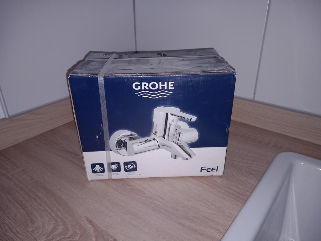 Nieuwe badkraan Grohe, Ophalen
