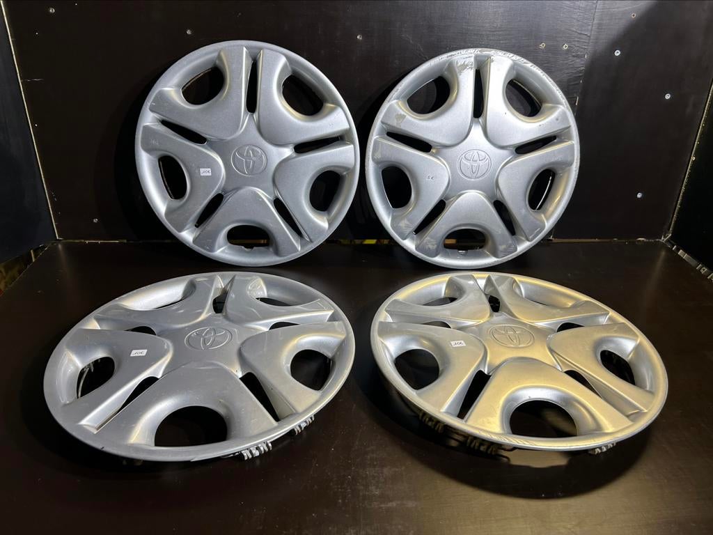 4 enjoliveurs Toyota corolla yaris aygo 14", Enlèvement ou Envoi, Utilisé