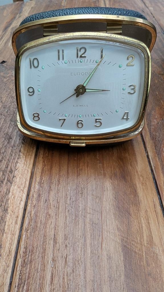 Vintage Reiswekker, Ophalen
