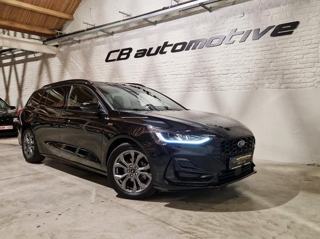 Ford Focus ST line break, Stof, https://public.car-pass.be/vhr/d1726192-e31c-499a-8415-32f0cdc3eee7, Zwart, 5 deurs