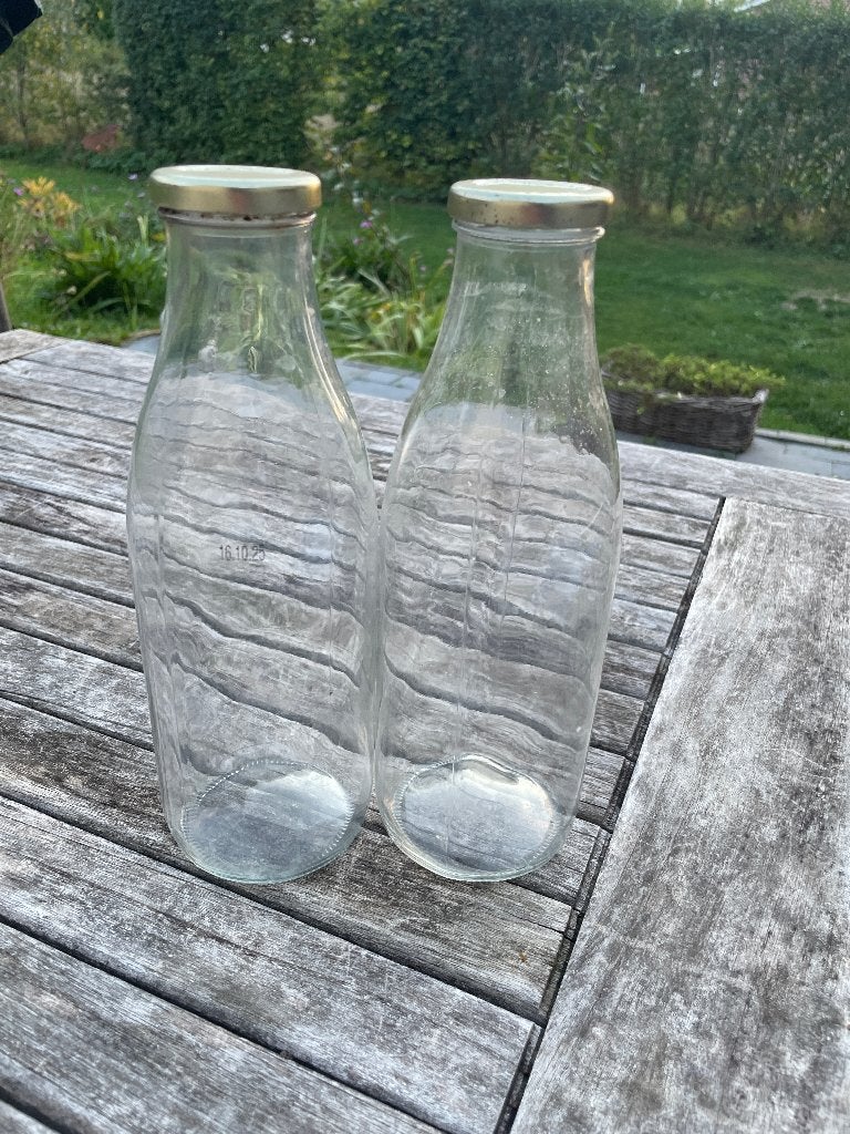 100 Bouteilles verre 1L, Maison & Meubles, Enlèvement, Utilisé, Verre