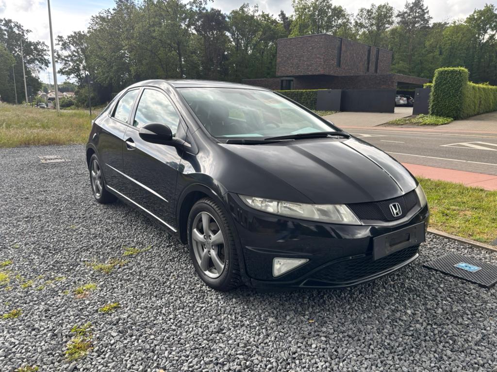 Honda civic GEKEURDVVK, Auto's, Honda, Euro 5, Zwart, 4 cilinders, Leder en Stof