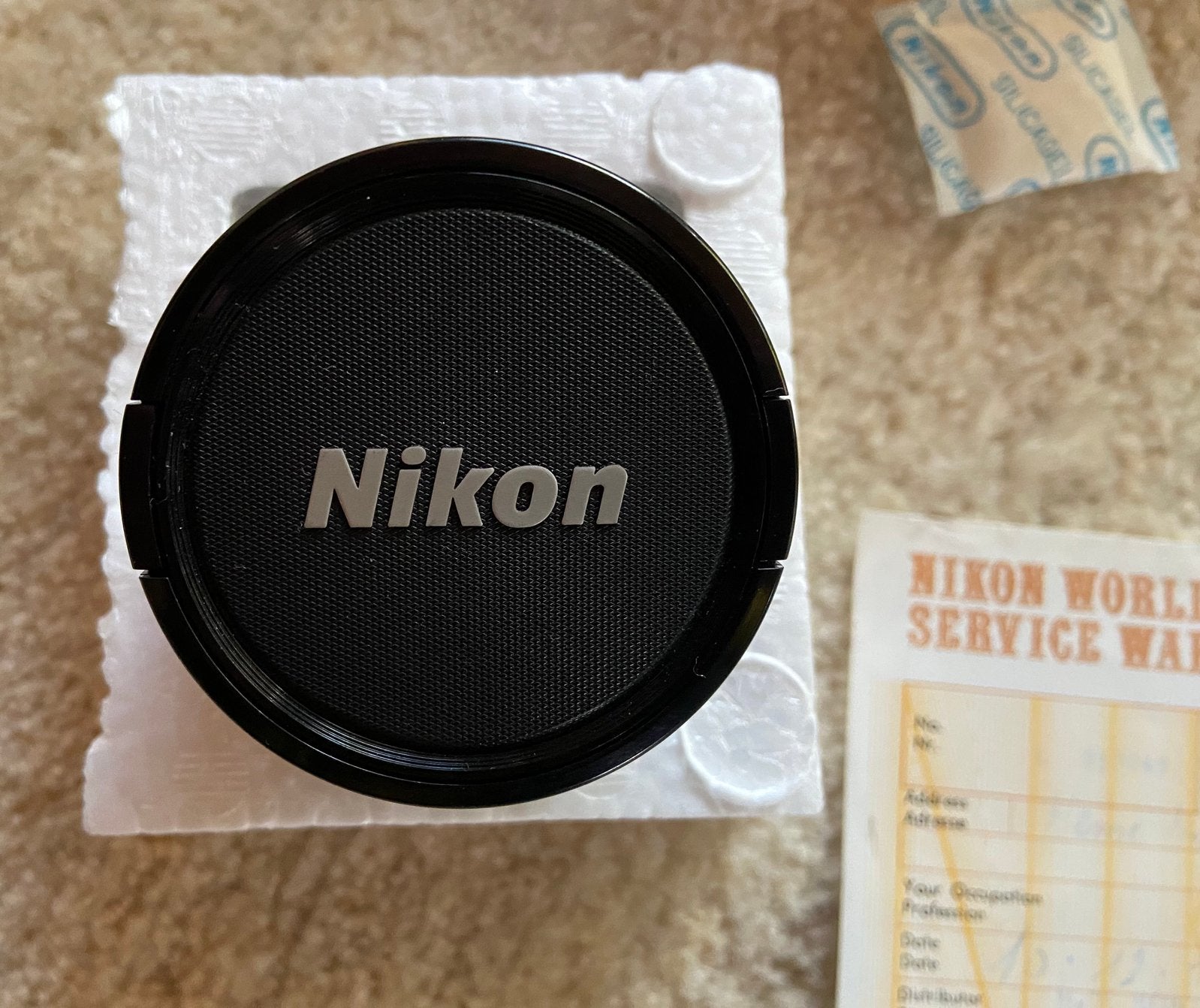Nikkor 20 mm f/2,8, Enlèvement, Comme neuf