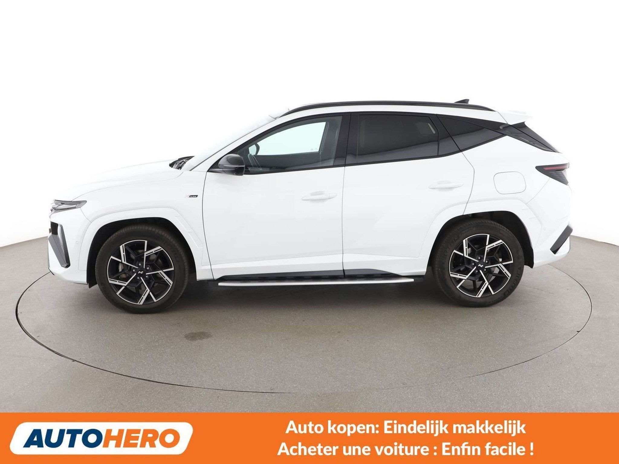 Hyundai Tucson 1.6 T-GDI Hybrid N Line (bj 2025, automaat), Auto's, Gebruikt, Zwart, 1776 kg, Wit