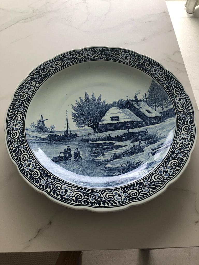 Delfte bord blauw wit, Ophalen