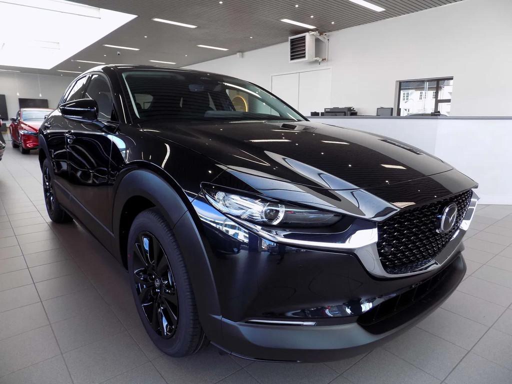 Mazda CX-30 2.0i SKYACTIV-X Homura Automaat, Auto's, Automaat, 1998 cc, Stof, Zwart