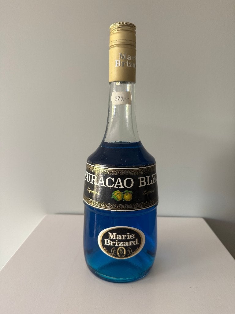 bouteille vintage de liqueur Marie Brizard Curaçao Bleu, Collections, Enlèvement ou Envoi, Pleine, Comme neuf, Autres types