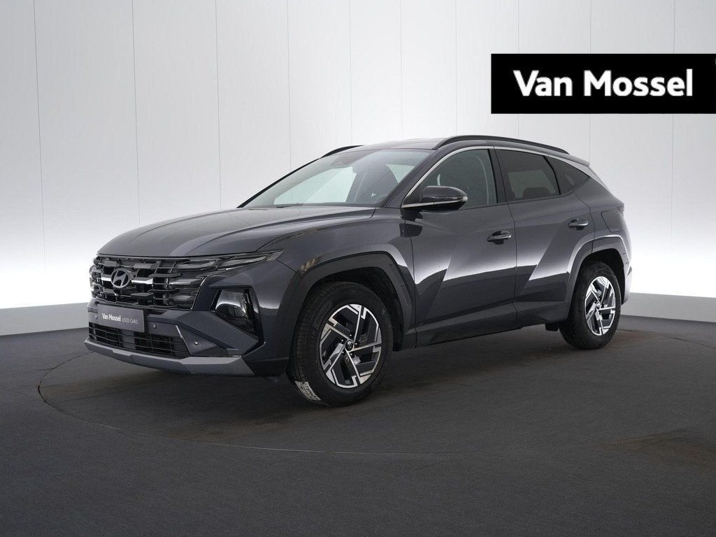 Hyundai Tucson 1.6 T-GDi 48V Feel 7-DCT, Auto's, Stof, Gebruikt, 4 cilinders, 159 pk