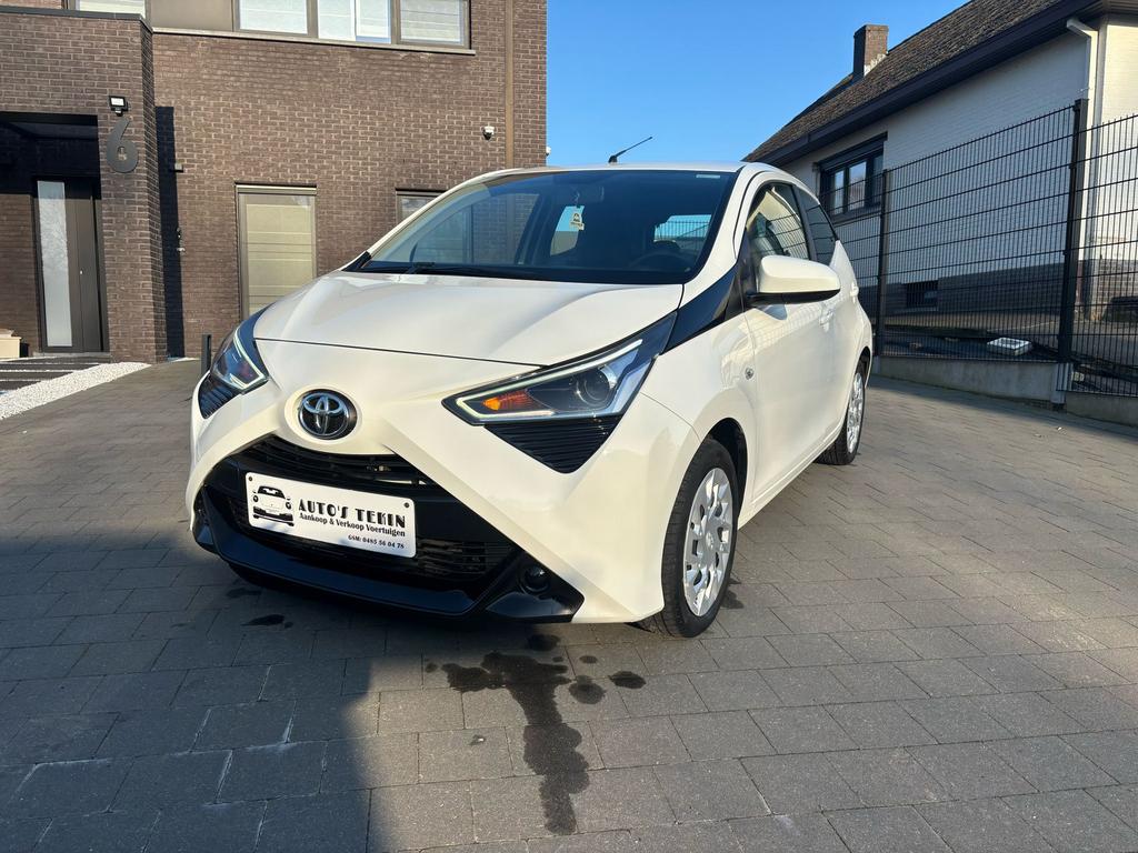 Toyota Aygo 1.0 Benzine | Cruise | Camera | Garantie, Voorwielaandrijving, 4 deurs, Stof, Wit