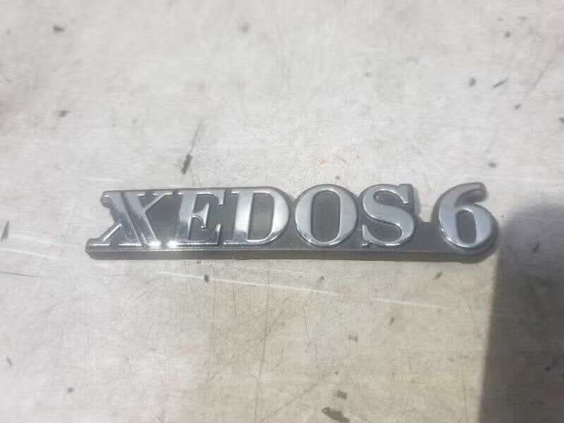 EMBLEEM Mazda Xedos 6 (01-1992/01-1999), Enlèvement ou Envoi, Hitdorfer Straße 73 51371 Leverkusen, DE, Mazda, Utilisé