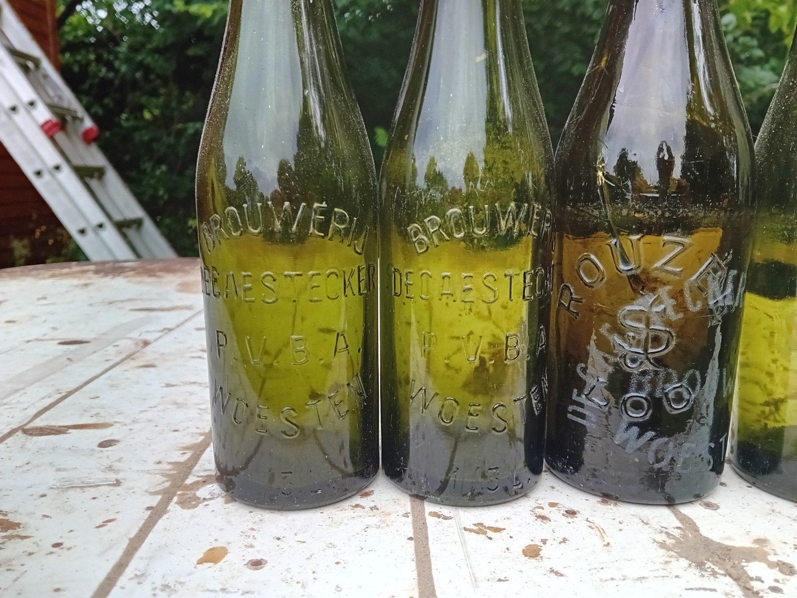 Oude vintage bierflessen brouwerij Decaestecker Deca Woesten, Ophalen of Verzenden